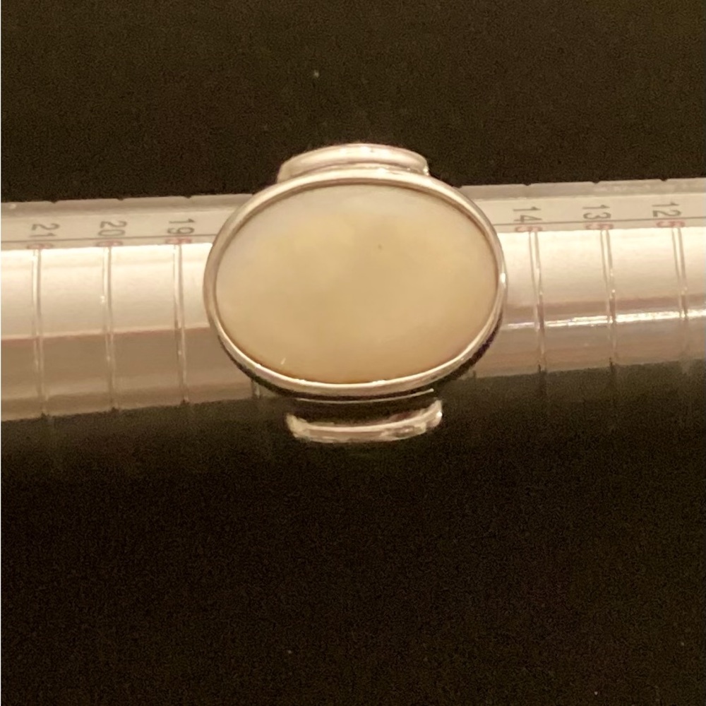 Mother of pearl stone (Nacre) SS verified by rock identifier, very sharp looking